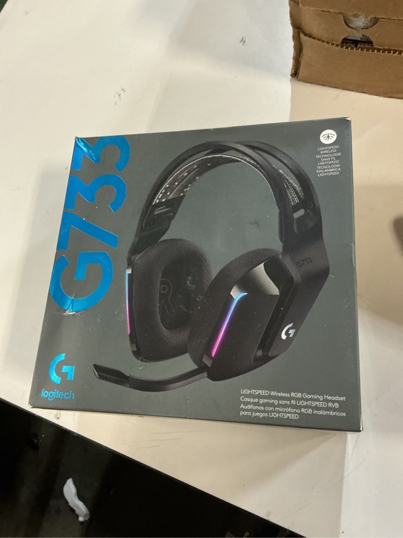 Condition photo showing New/Like New for Logitech G733 Lightspeed Wireless Gaming Headset with Suspension Headband, Lightsync RGB, Blue VO!CE mic technology and PRO-G audio drivers - Black