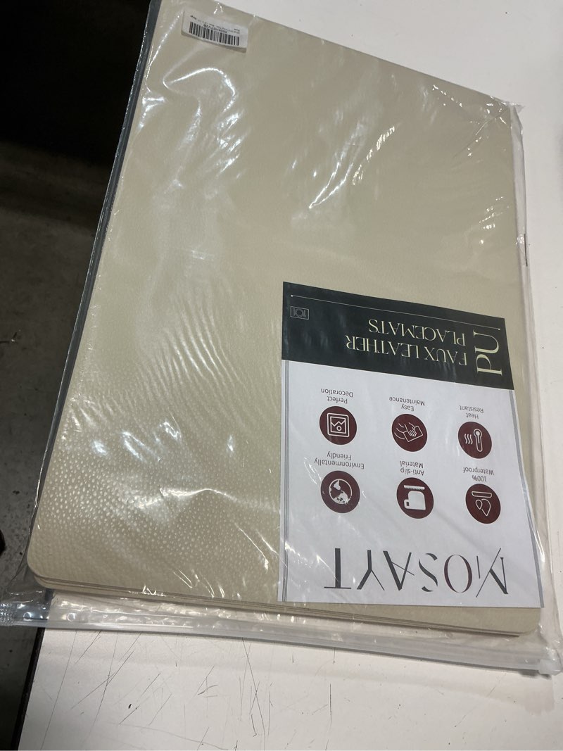 Condition photo showing New/Like New for mosayt vinyl placemats set of 8, heat resistant place mats 100% waterproof washable & wipeable faux leather reversible table mats for kitchen dining party indoor outdoor, 12" x 17", beige beige 8 pack
