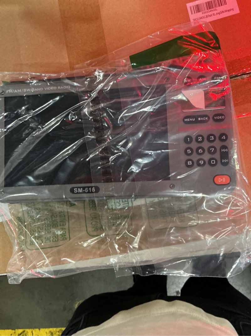 Condition photo showing New/Like New for 720p 7inch screen am fm movie video radio with bluetooth speaker, rechargeable digital shortwave mp3 mp4 player radio, support usb/micro sd card, loud speaker and headphone jack (no tv) grey