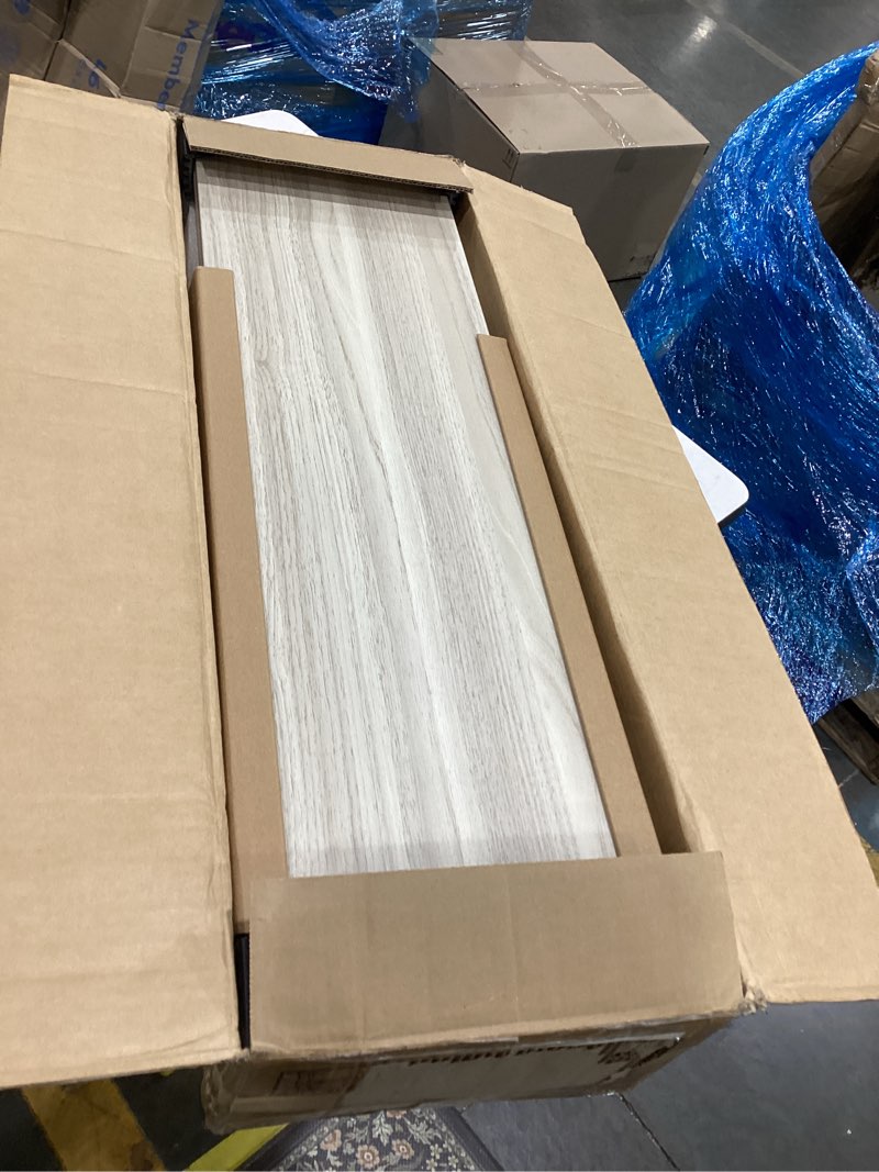 This item appears to be Haisa Light White Oak Marble tile, commonly available in sizes like 12x24 or 18x36 inches.