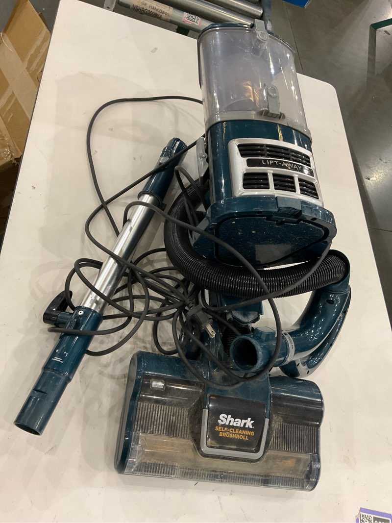 Condition photo showing As Is for Shark Upright Vacuum, Navigator Lift-Away with Self-Cleaning Brushroll, HEPA Filter, Swivel Steering, Upholstery Tool & Pet Crevice Tool, Perfect for Pets & Multi-Surface, Teal, ZU503AMZ