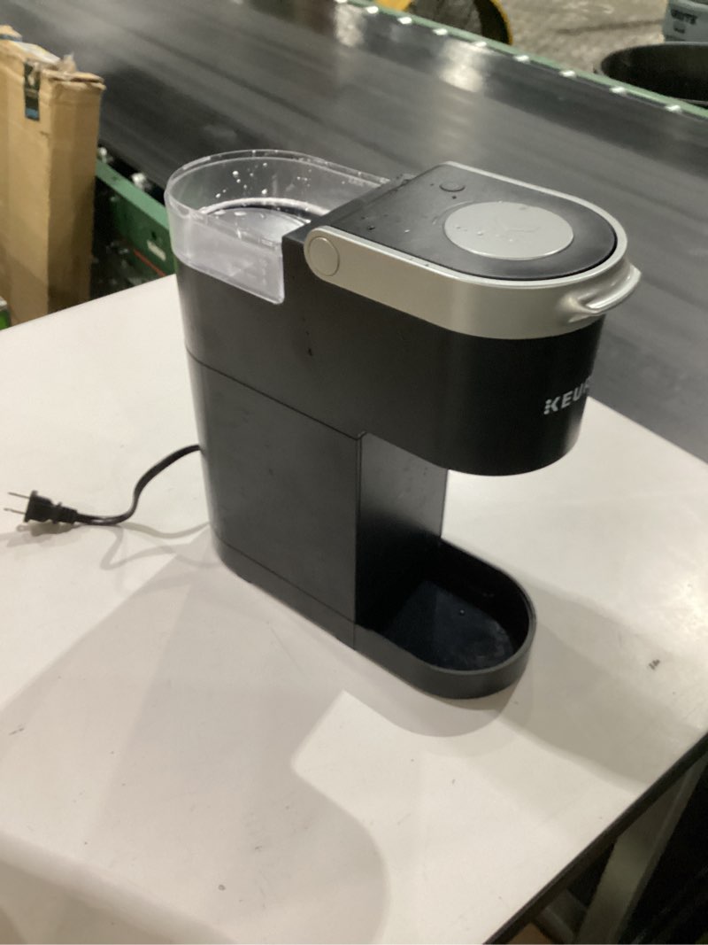 Condition photo showing As Is for keurig k-mini single serve k-cup pod coffee maker, 6 to 12oz brew size, with cord storage, perfect for small spaces, black