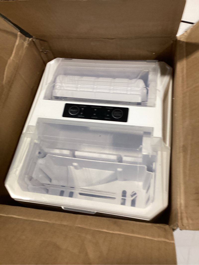 Condition photo showing New/Like New for OLIXIS Ice Maker Machine, 26lbs in 24Hrs, 9 Ice Cubes in 6 Mins,Auto-Cleaning Portable Ice Maker with Basket and Scoop, Countertop Ice Maker for Home/Kitchen/Camping/RV, White