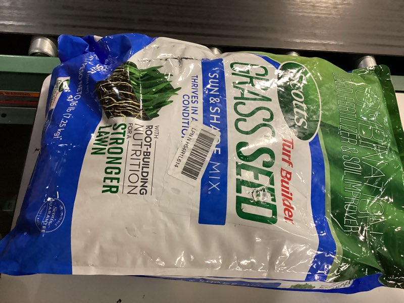 Condition photo showing New/Like New for scotts turf builder grass seed sun and shade mix - grass seed plus lawn fertilizer and soil improver, covers up to 6,400 sq. ft., 16 lb.