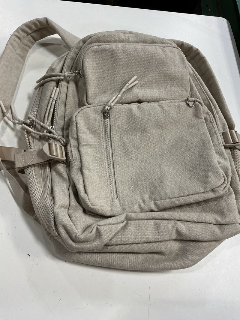 Condition photo showing Good Condition for women's 17.5\\\" multi pocket backpack, taupe beige