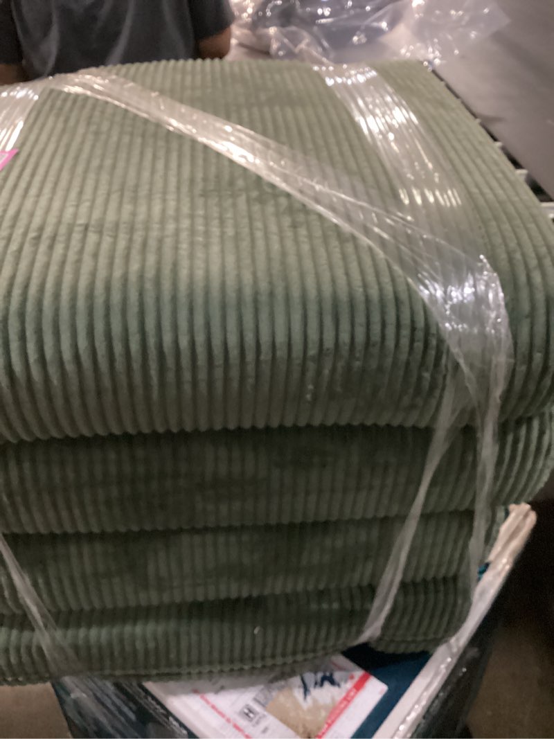 Condition photo showing As Is for 4 green sofa cushions size 20”x21”- 4 inch