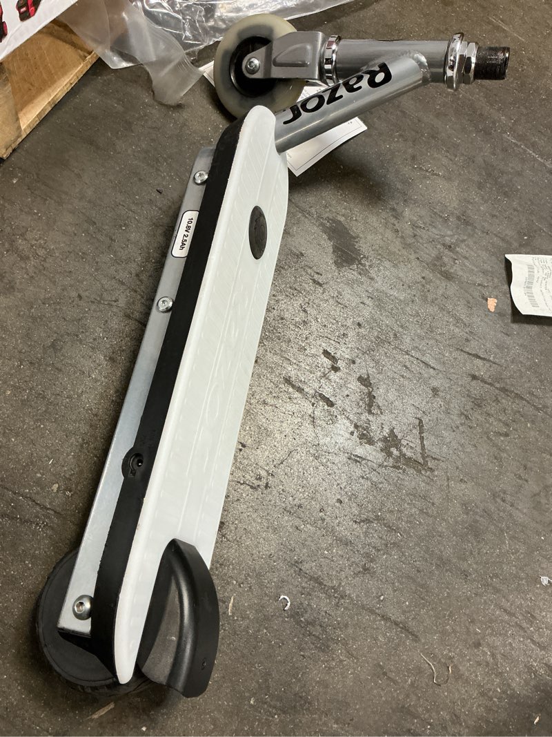 Condition photo showing As Is for razor color rave electric scooter - colorful light-up deck, up to 7.5 mph, for child ages 6+ (incomplete  /demagned