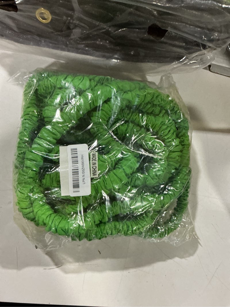 Condition photo showing As Is for garden hose 75ft, pliable lightweight water hose with triple layer 3/4" fittings ergonomic grip indoor & outdoor use gift for lawn backyard collapsible & car wash watering plants green