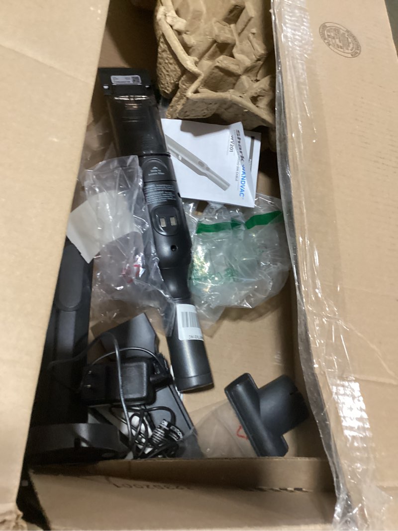 Condition photo showing As Is for shark wandvac cordless hand vac, lightweight, versatile and portable at 1.4 lbs., powerful suction for pet hair, charging dock, one-touch empty for car & home, duster crevice tool, black, wv201bk