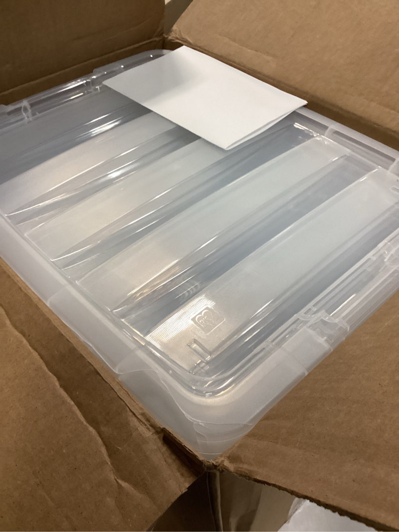 Condition photo showing As Is for IRIS USA 40 Qt Stackable Plastic Storage Bins with Lids, 4 Pack - BPA-Free, Made in USA - See-Through Organizing Solution, Latches, Durable Nestable Containers, Secure Pull Handle - Clear Clear 40 Qt 4 Pack