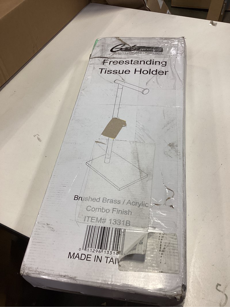 Condition photo showing As Is for Gatco 1331B Modern Rectangle Base Freestanding Toilet Paper Holder 22.25" Brushed Brass/Acrylic with Weighted Base