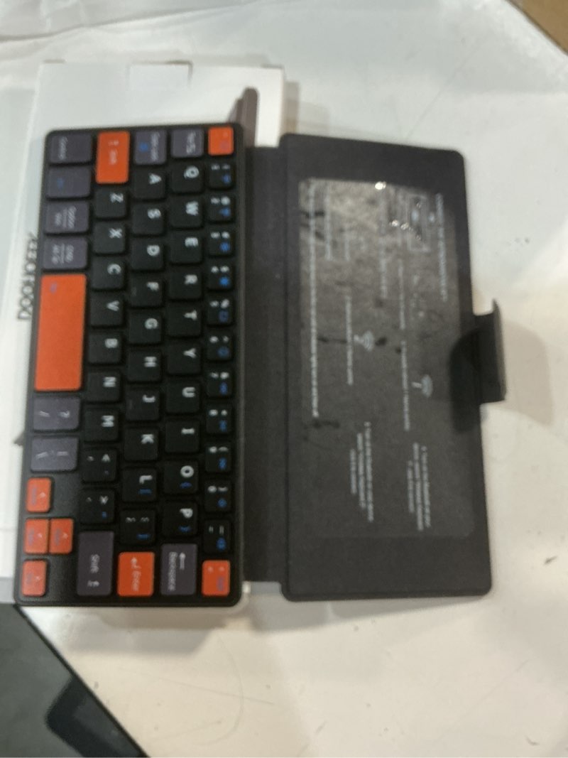 Condition photo showing Good Condition for doohoeek universal bluetooth mini keyboard, wireless compact keyboard with orange navigation keys & any-angle stand for android/ios/windows, dual-device keypad for phones/galaxy z fold/ipad mini