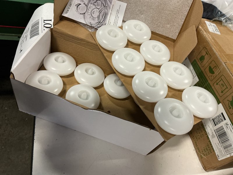 Condition photo showing As Is for (incomplete )homemory 24 pack 3” flameless led floating candles, 200 hour white battery operate waterproof tealights for cylinder vases, centerpieces at wedding decor, party, pool white base 24 pack