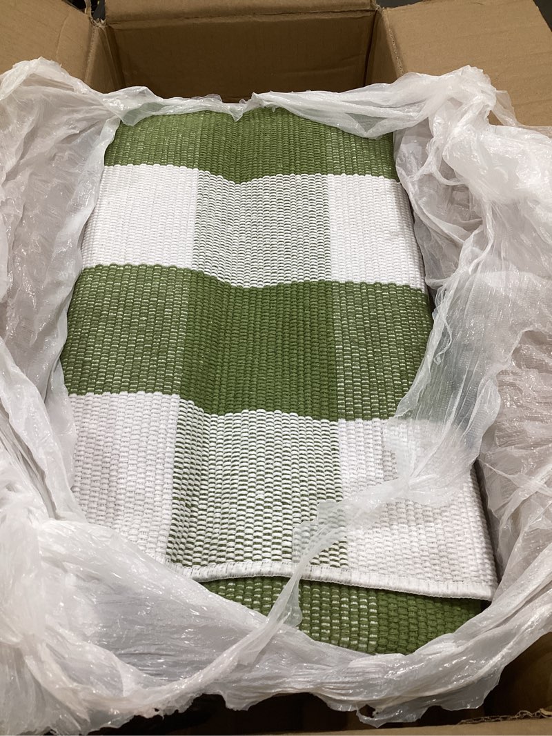 Condition photo showing As Is for spring pink and white plaid rug, 2'4" x 3'7" cotton blend layered doormat rug for front door, hand-woven washable entryway & porch decor 2'4" x 3'7" light pink and white