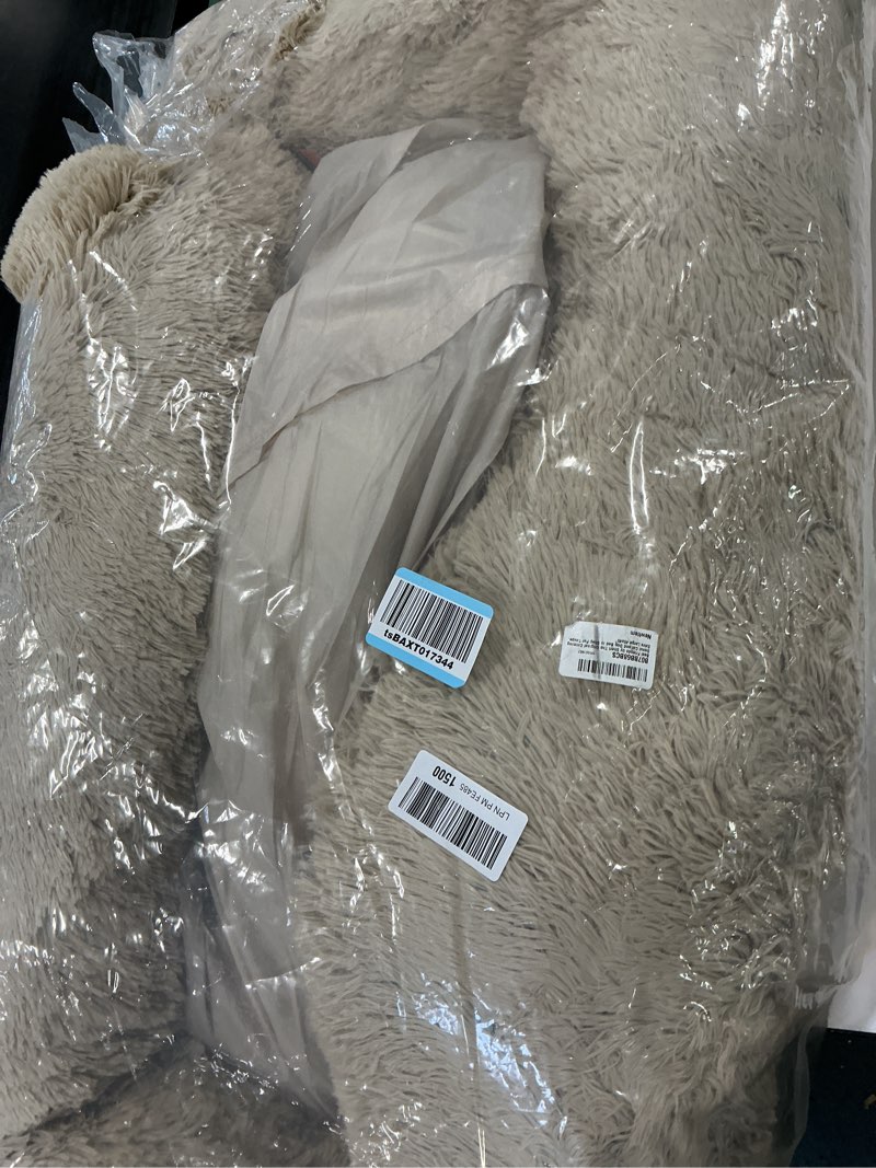 Condition photo showing As Is for Best Friends by Sheri Original Calming Donut Dog and Cat Bed, Shag Faux Fur, Taupe, XL (45in x 45in) - Anxiety Relief for Pets Up to 150 lbs Taupe Shag X-Large