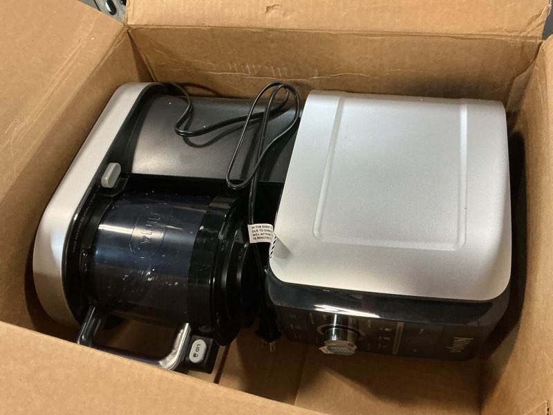 Condition photo showing Good Condition for Ninja CREAMi Deluxe Ice Cream Maker, Treats and Frozen Desserts, Sorbet, Milkshakes, Yogurt and More, 11-in-1 Programs, XL Capacity, Includes Two 24-oz Family-Size Tubs, Silver, NC501