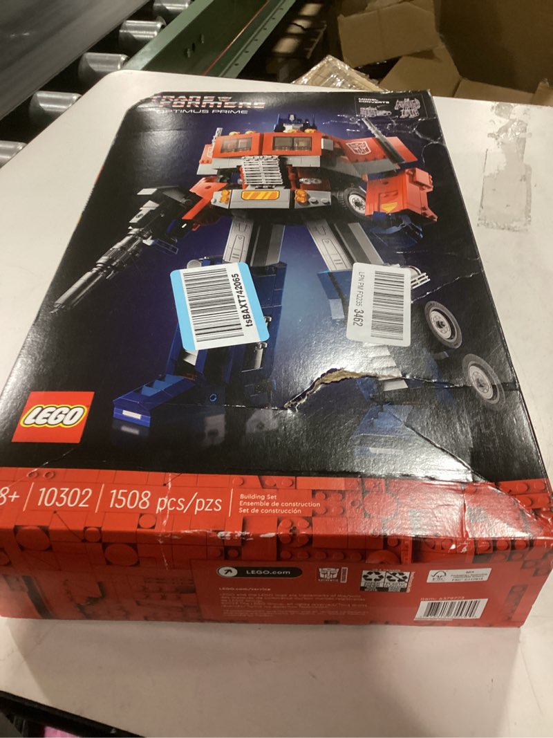 Condition photo showing New/Like New for lego icons optimus prime 10302 transformers figure set, collectible transforming 2-in-1 robot and truck model building kit for adults, perfect for display or play