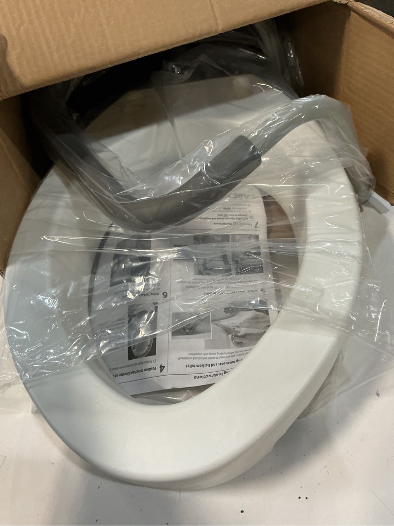 Condition photo showing New/Like New for Carex 3.5 Inch Raised Toilet Seat with Arms, Elongated Toilet Seat Riser, Up to 250 lbs Capacity, Elevating & Raising Seat for Elderly & Handicap, Universal, Slip-Resistant with Padded Handles, White