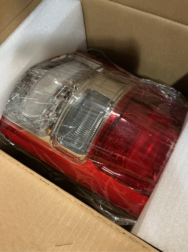 Condition photo showing Good Condition for tail light chrome bezel compatible with 2019-2023 dodge ram 1500 left driver side taillight replace 55112989ae chrome bezel left