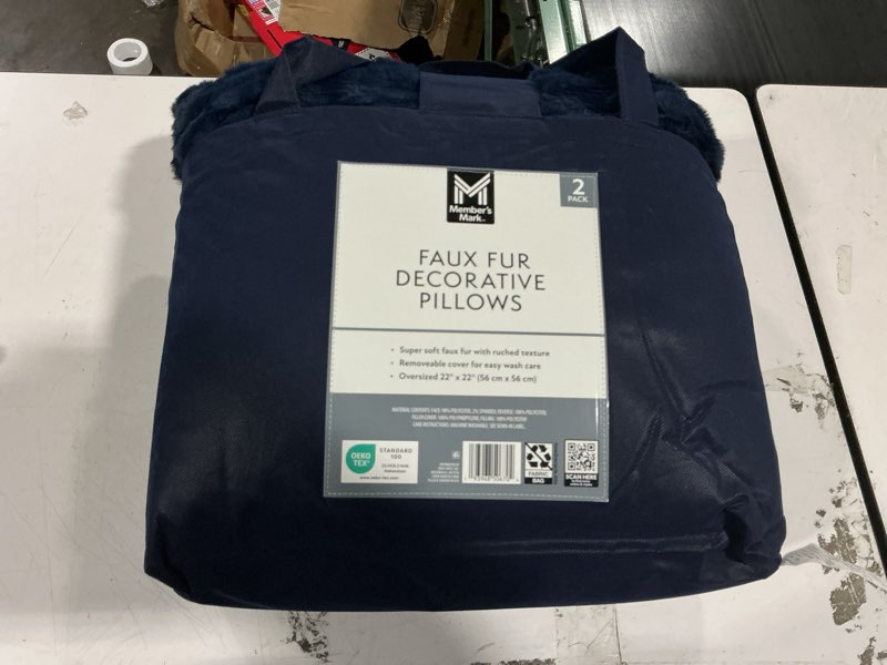 Condition photo showing New/Like New for member's mark 2-pack ruched faux fur decorative pillows, 22" x 22"