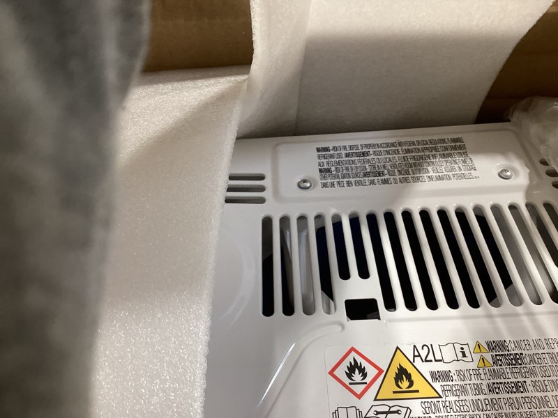 Condition photo showing Good Condition for amazon basics 5000-btu small window air conditioner, up to 150 sqf, window ac units with cool and fan functions, washable filter, adjustable window kit, intuitive mechanical controls, white white 5000 btu