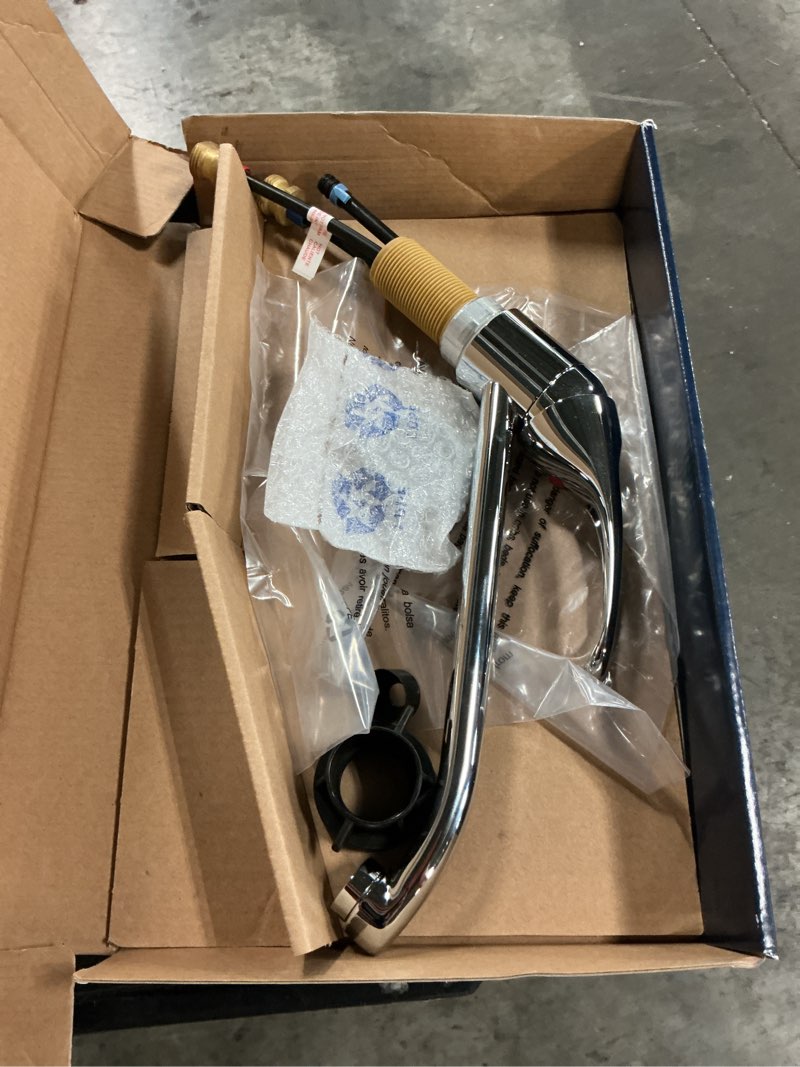 Condition photo showing As Is for project source wakebridge polished chrome single handle kitchen faucet (deck plate and side spray included)