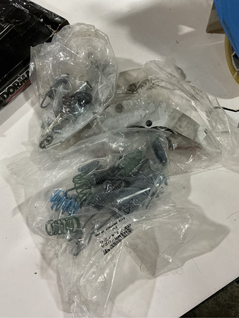 Condition photo showing As Is for dorman hw2324 rear drum brake hardware kit compatible with select cadillac / chevrolet / gmc models