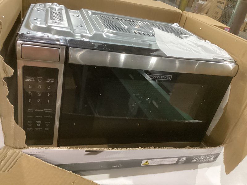 Condition photo showing New/Like New for BLACK+DECKER EM720CB7 Digital Microwave Oven with Turntable Push-Button Door, Child Safety Lock, 700W, Stainless Steel, 0.7 Cu.ft 0.7 cu. ft., NOT TESTED