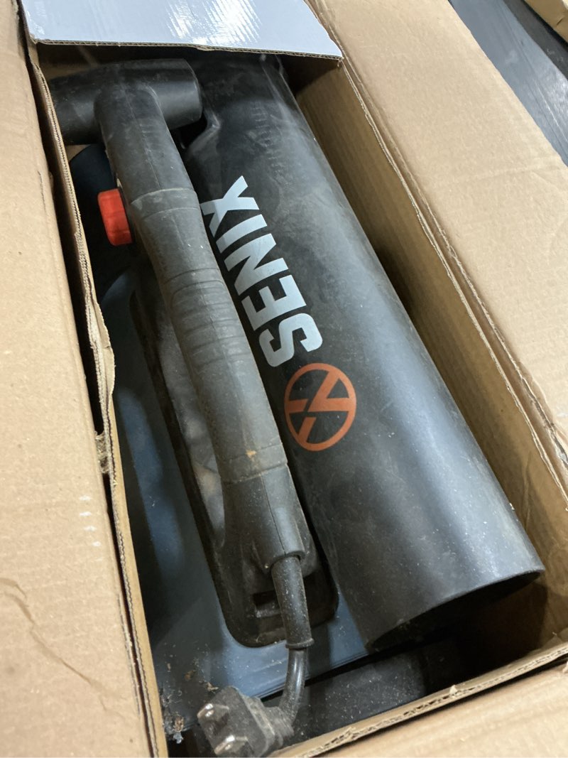 Condition photo showing As Is for senix 12 amp handheld electric leaf blower, up to 700 cfm and 110 mph, variable speed, lightweight, 120v (blae12-m)