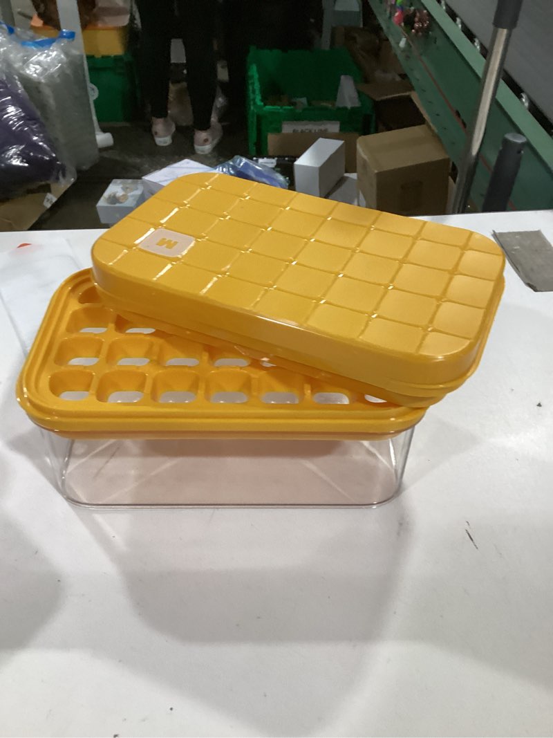 Condition photo showing Good Condition for brigii ice cube tray with lid&bin, ice cube mold with 56 cubes, stackable ice trays for freezer with easy-release silicone bottom, for drinks, coffee, cocktail orange