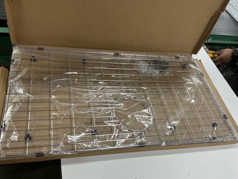 Condition photo showing New/Like New for 29.3 in. x 15.4 in. rear drain kitchen sink bottom grid with supersoft silicone feet in 304 grade stainless steel