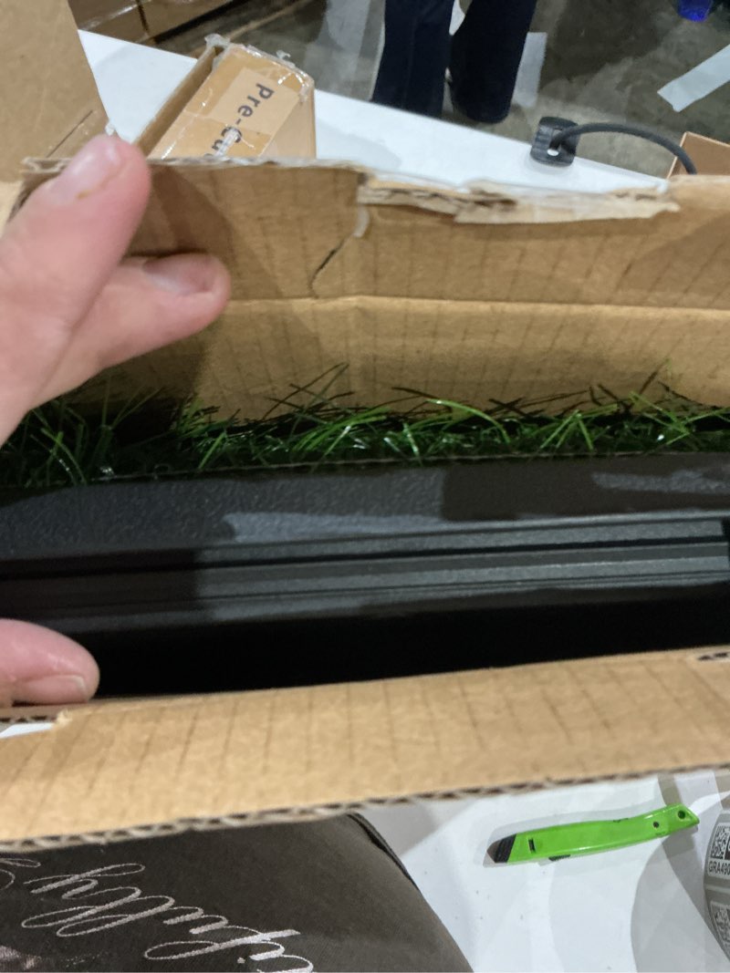 Condition photo showing As Is for artificial grass pad for dogs potty: fake grass for dogs puppy potty training to pee and poop on balcony, backyard, patio, apartment - protect floor and furnitures, 2x faster drainage, easy to clean l-33.2"x20.8"