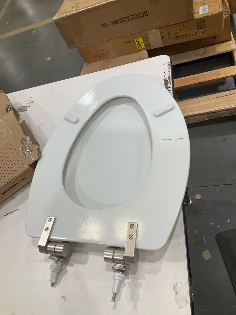 Condition photo showing As Is for mayfair bennett toilet seat with brushed nickel hinges, slow close wood seat, secure metal hinges, easy install, elongated, white elongated brushed nickel