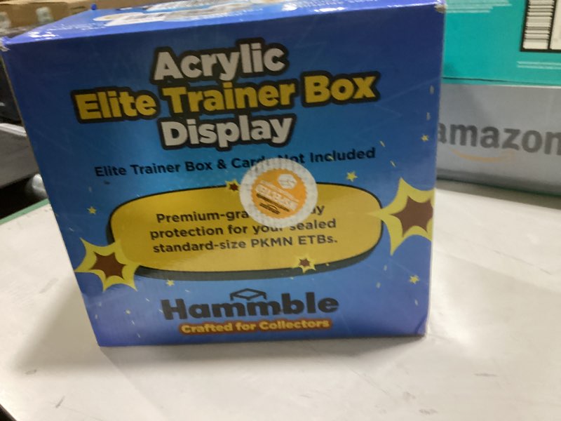 Condition photo showing Good Condition for acrylic elite trainer box display case by hammble – magnetic lid, 8mm thick walls, uv protection – fits standard english pkmn etb boxes – hammble crafted for collectors  acrylic display