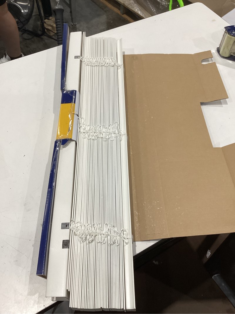 Condition photo showing As Is for levolor trim+go 2-in slat width 34-in x 64-in cordless white faux wood room darkening horizontal blinds