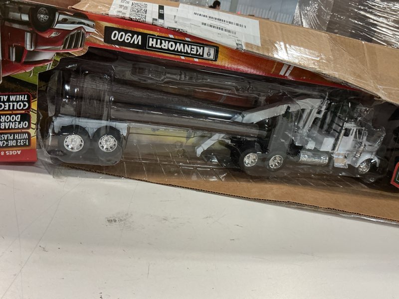 Condition photo showing Good Condition for Die-Cast Truck Replica - Kenworth W900 Log Carrier, 1:32 Scale, Model# 13743 Color May Vary