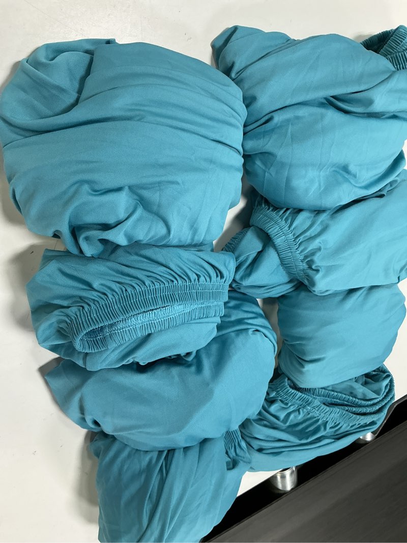 Condition photo showing Good Condition for pickynproud 8pcs patio cushion covers stretch outdoor couch cushions slipcovers replacement washable furniture protector with elastic bottom sofa chair seat cover, aqua blue aqua blue 8pcs