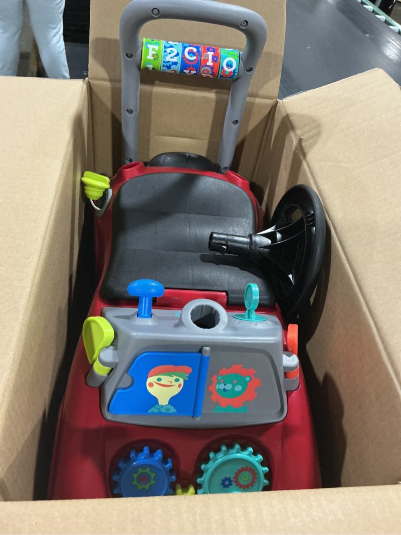 Condition photo showing Good Condition for radio flyer busy buggy, for toddlers 1-3, 3-in-1 push walker ride on car with 17 sensory activities, anti-tip feature, under-seat storage, horn and gears, 42 lb capacity, toddler ride on toys red