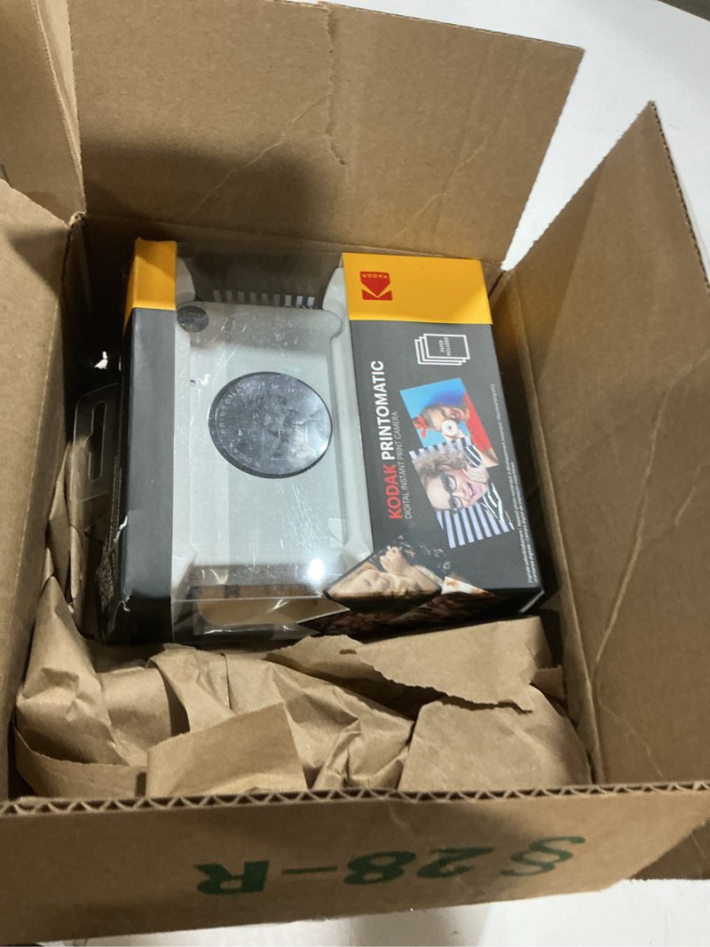 Condition photo showing Good Condition for KODAK Printomatic Full-Color Instant Print Digital Camera - Colorful Photos On Zink 2x3" Sticky-Back Photo Paper - 5MP, Portable, Creative Fun Gift for Birthday, Christmas, Holiday - Grey Grey Camera