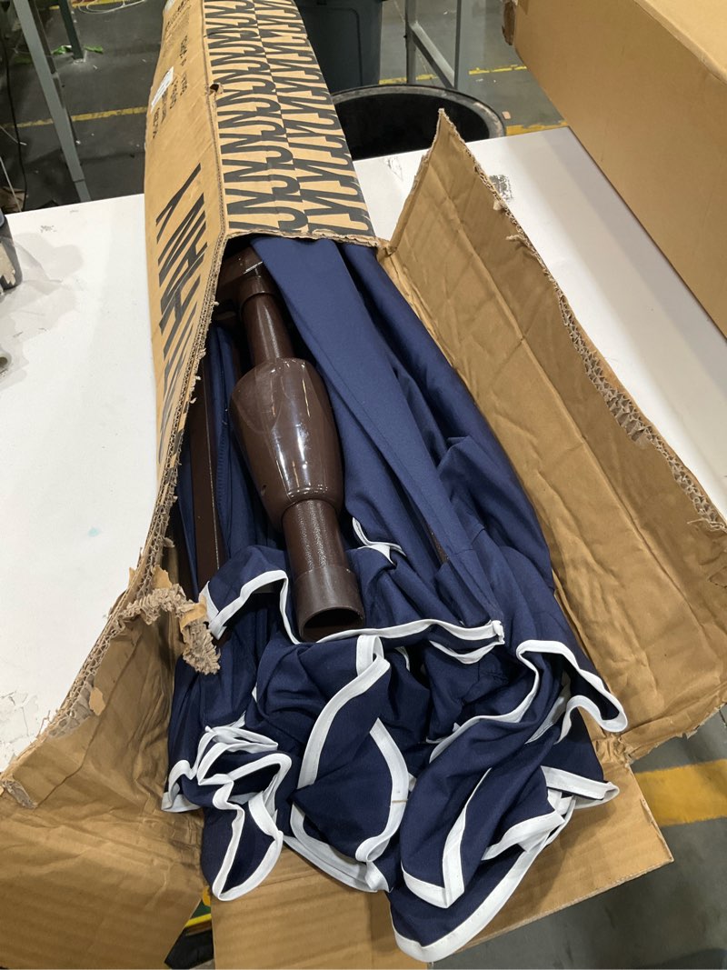 Condition photo showing Good Condition for jonathan y terrace 9 ft. scalloped half patio umbrella, navy/brown | crank lift, push button tilt, dark brown aluminum pole, uv resistant polyester canvas, coastal style, space saving navy/white (dark brown pole)