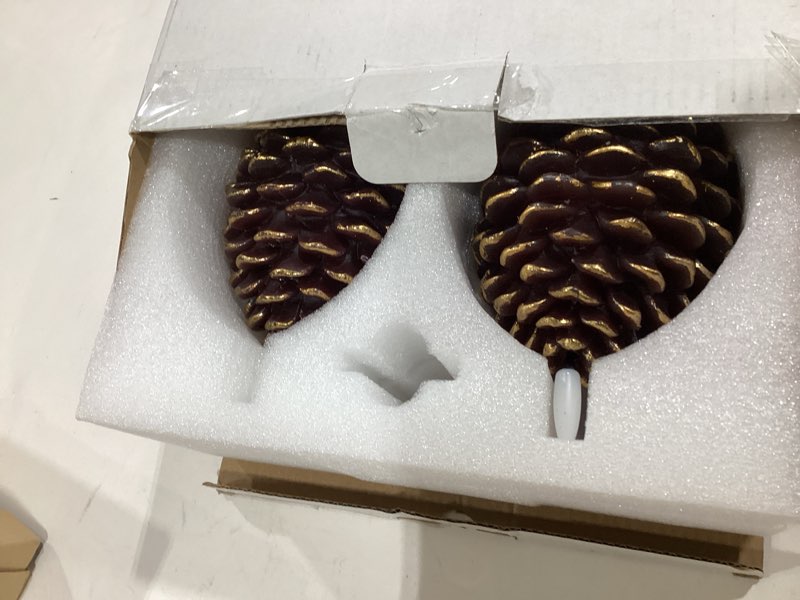 Condition photo showing As Is for 2Pcs Pine Cone Flameless Candles with Remote and Timer,LED Candles Battery Operated,Real Wax Window Candlesticks with Flickering 3D Flame for Winter Christmas Thanksgiving Decoration Brown-2PCS