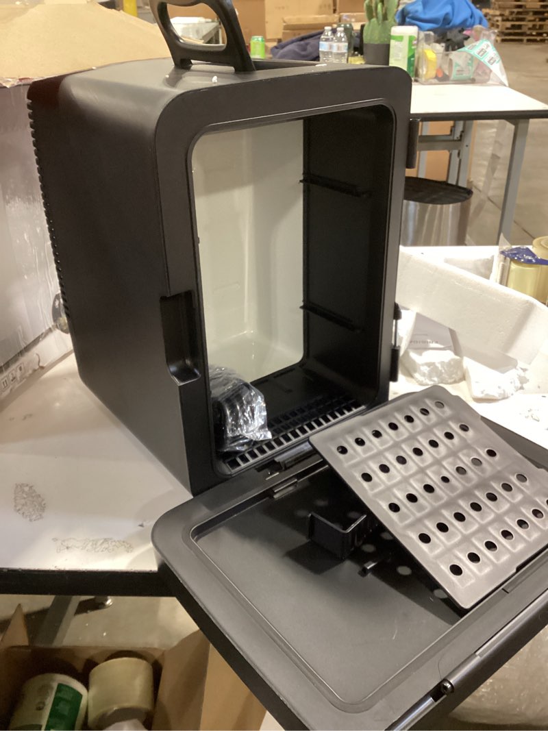 Condition photo showing As Is for Frigidaire Portable 10L, 15-can Mini Fridge Brushed Stainless Rugged Refrigerator, EFMIS188-SS