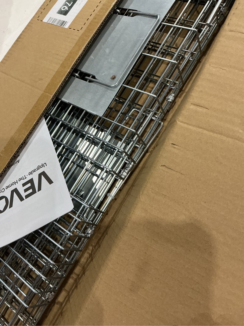 Condition photo showing Good Condition for vevor live animal cage trap, 31" x 10" x 12" humane cat trap galvanized iron, folding animal trap with handle for rabbits, stray cats, squirrels, raccoons, groundhogs and opossums