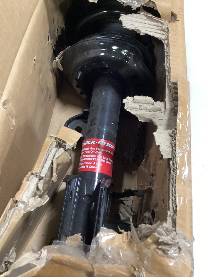 Condition photo showing As Is for Suspension Strut and Coil Spring Assembly-Quick-Strut Complete Strut Assembly  eBay Visit 
