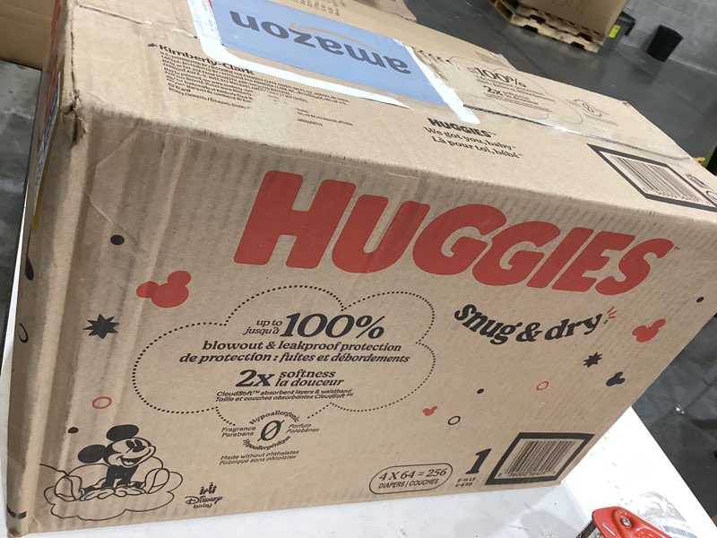 Condition photo showing New/Like New for huggies snug & dry diapers -size 1 - 256ct