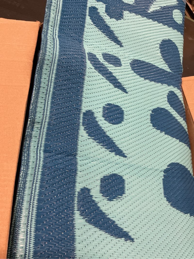 Condition photo showing As Is for garvee reversible outdoor patio rug - waterproof plastic straw mat with vintage floral design - collapsible & uv resistant - ideal for rv, camping, deck, porch, balcony, backyard - navy blue/lake green, 5x8ft