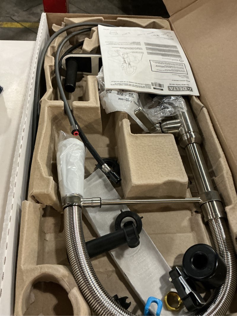 Condition photo showing As Is for delta rhett pro style commercial kitchen faucet with pull down sprayer, brushed nickel single hole kitchen sink faucet, single handle, stainless 18829-ss-dst