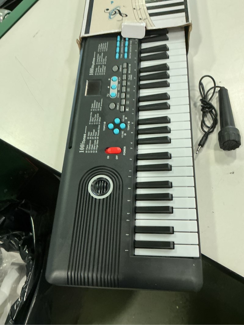 Condition photo showing Good Condition for 61 keys keyboard piano, Electronic Digital Piano with Built-In Speaker Microphone, Portable Keyboard Gift Teaching for Beginners, electric piano for kids Black