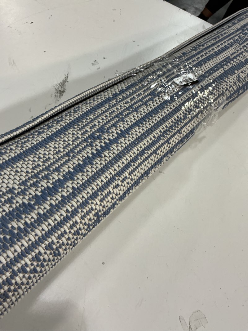 Condition photo showing As Is for customer reviews for hampton bay windermere navy 8 ft. x 10 ft. abstract indoor/outdoor area rug