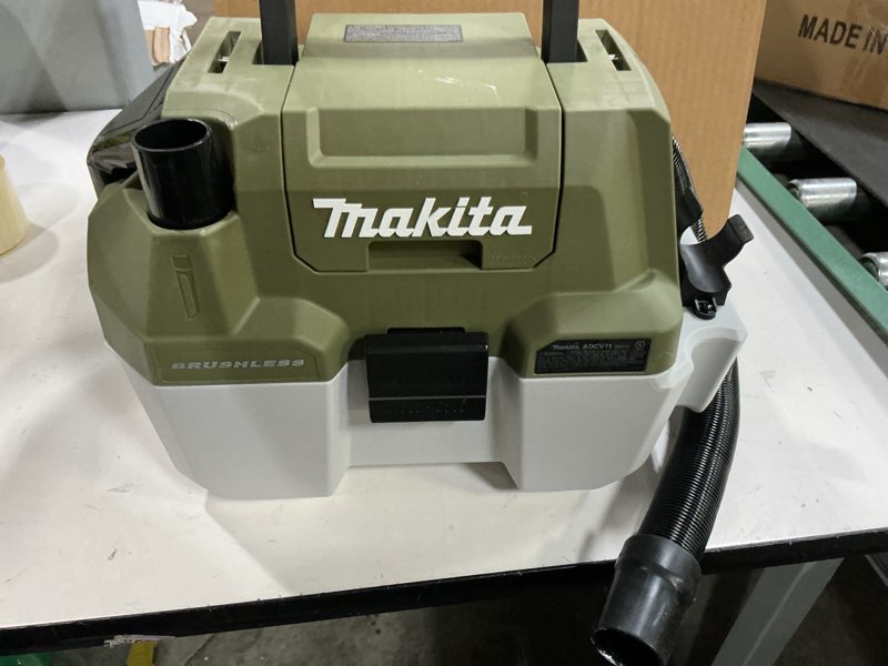Condition photo showing As Is for makita adcv11z outdoor adventure™ 18v lxt® brushless wet/dry vacuum, tool only bare tool camo green